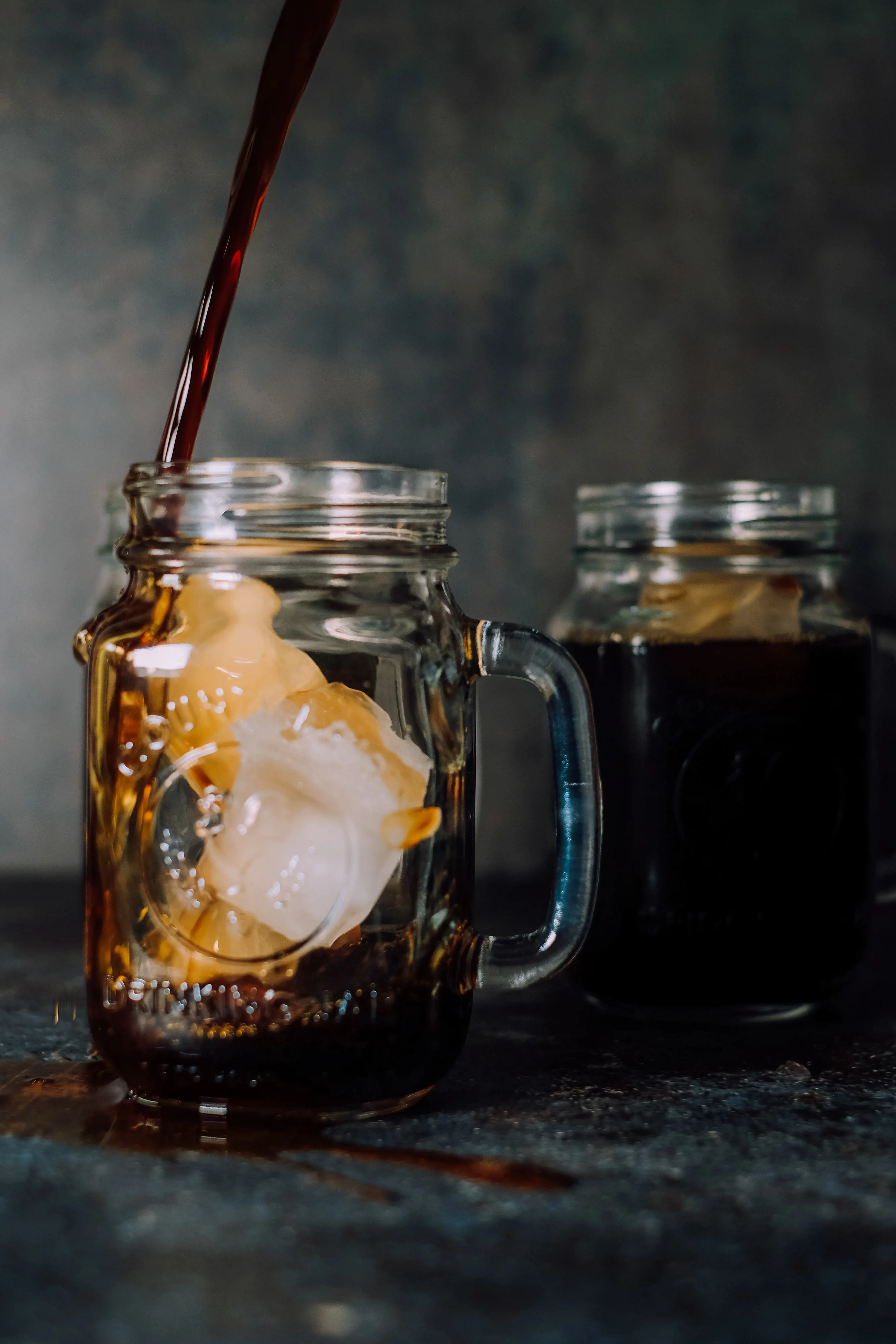 Cold brew coffee with ice cubes for a tasting test